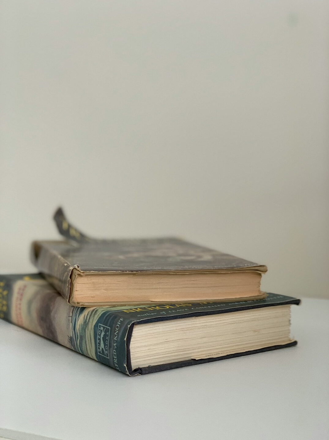 Stack of old books on a table