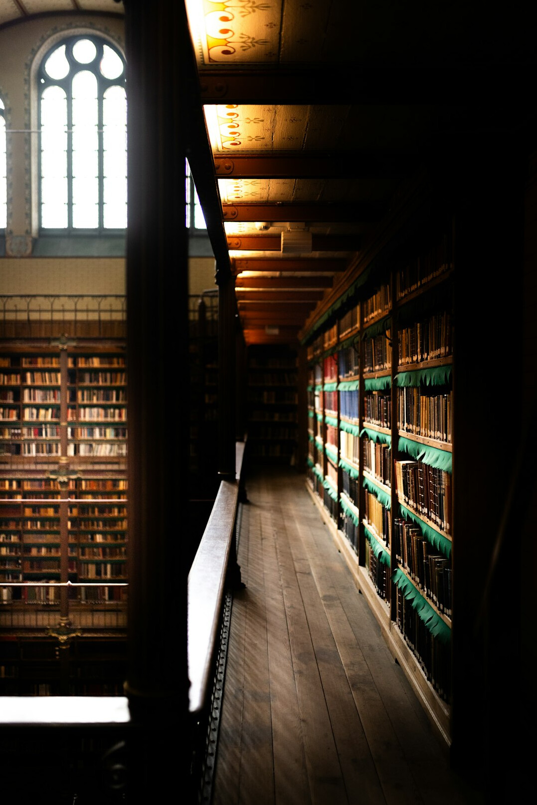 Old library with tall bookshelves