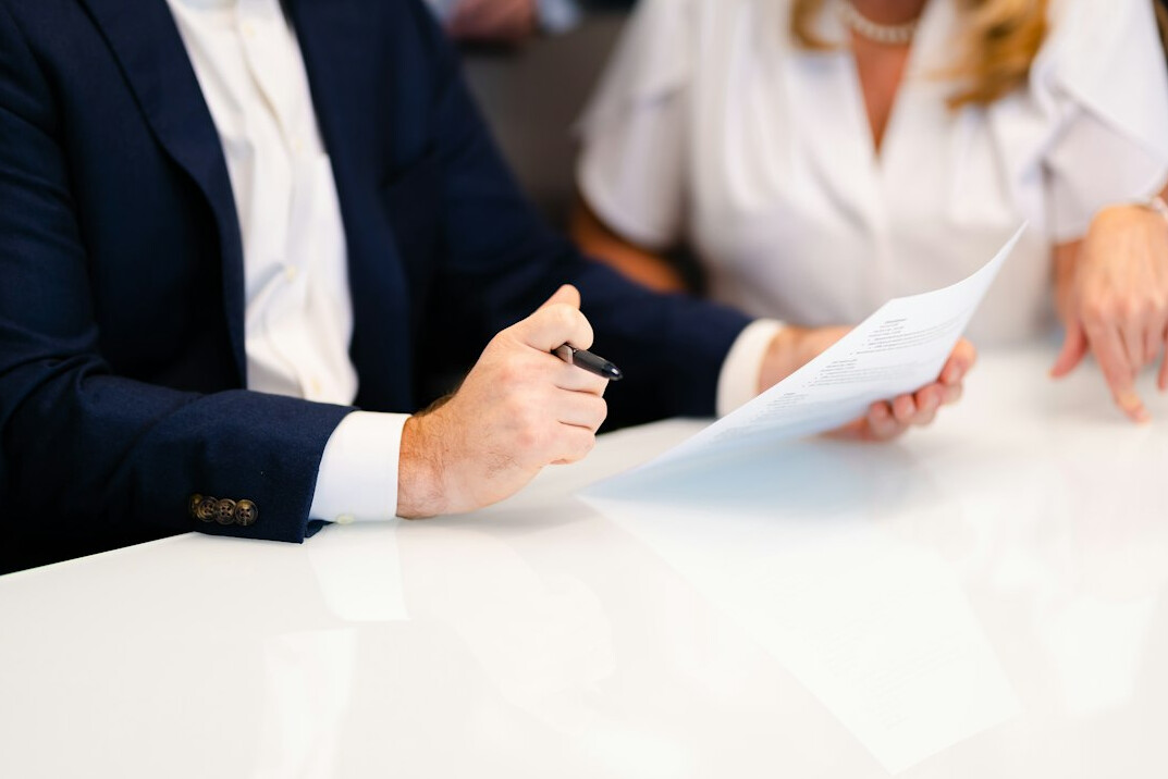 corrupt businessman signing contract