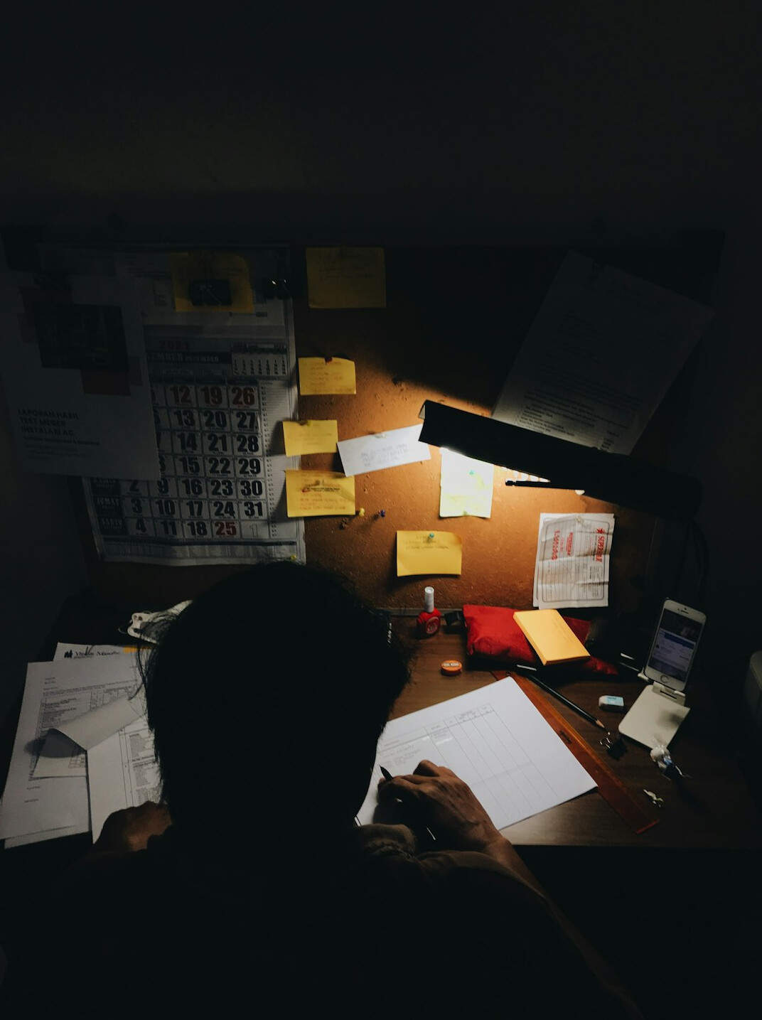 investigative journalist at desk