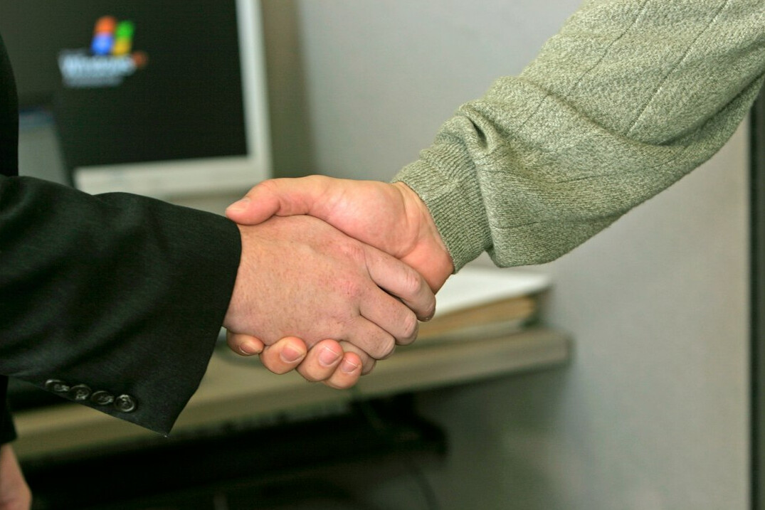 corrupt official handshake