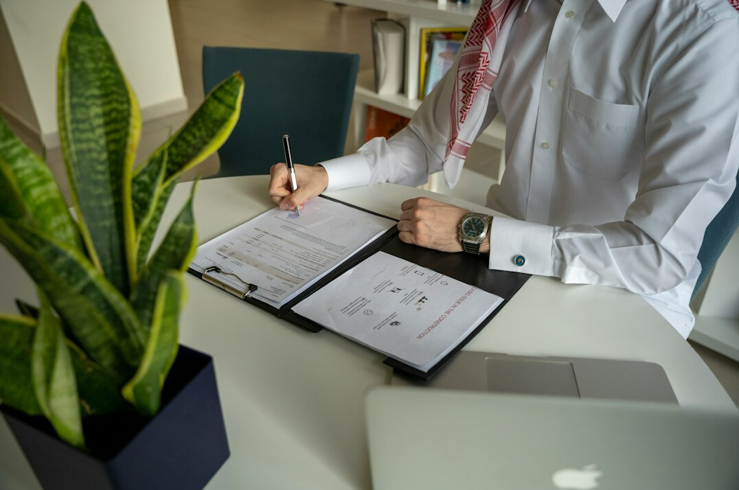 corrupt businessman signing contract